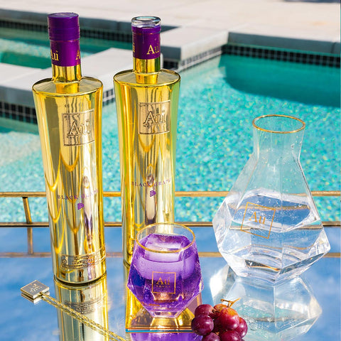 Au Vodka Black Grape flavored vodka mirror-gold 750ml bottle poolside